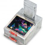 AN ART DECO LACQUER, MOTHER-OF-PEARL, CORAL AND SILVER SMOKER'S COMPENDIUM, BY CARTIER