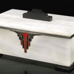 An Art Deco onyx, jewel casket with silver and enamel mounts, attributed to Lacloche Frères, French, circa 1930
