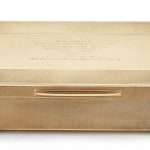 A 9CT GOLD PRESENTATION CIGARETTE BOX by Padgett & Braham Ltd