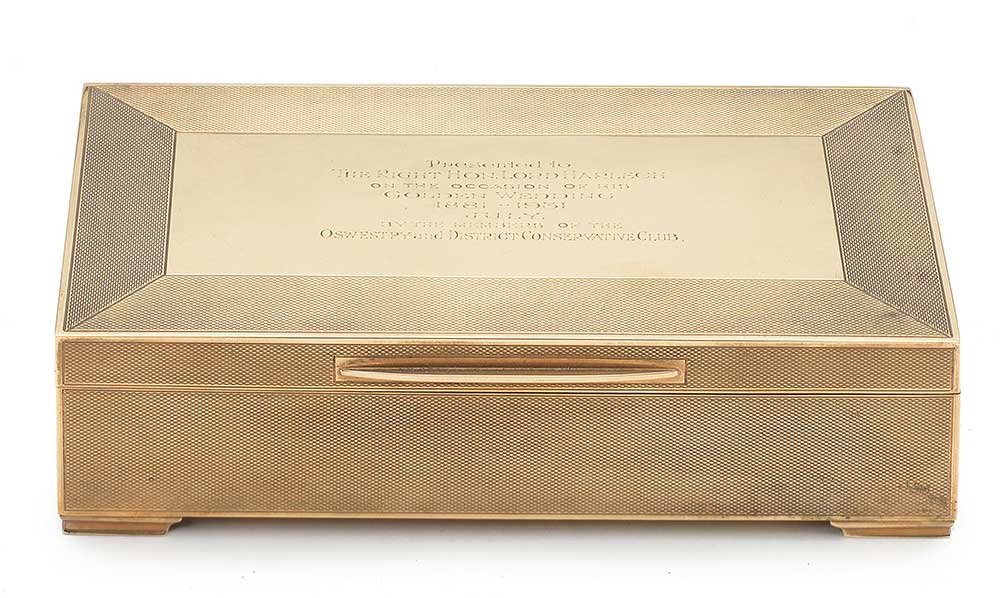 A 9CT GOLD PRESENTATION CIGARETTE BOX by Padgett & Braham Ltd